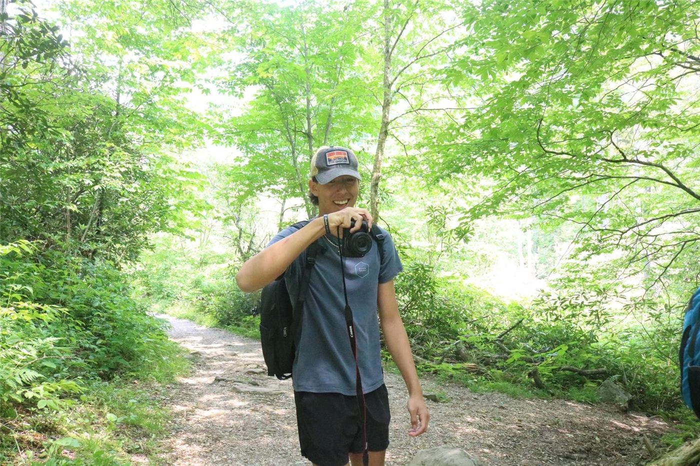 Francisco on a forest trail